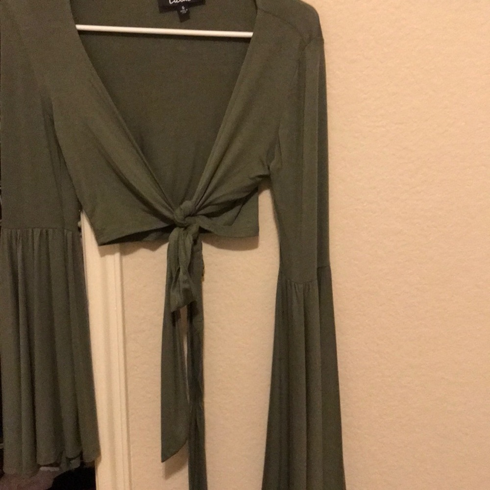 Green tie front with bell sleeves crop top.
